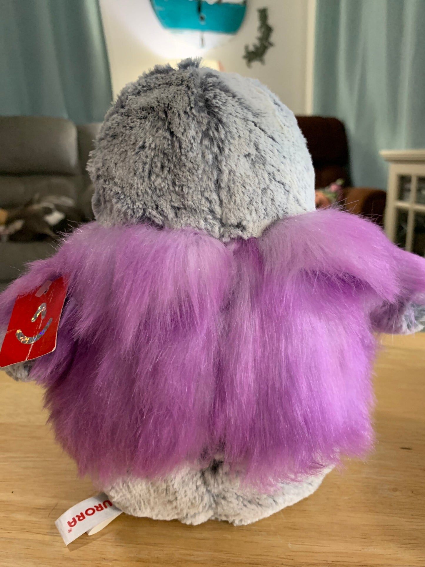 Aurora Purple Pom Pom Gray and White Penguin Plush. Approximately 8.5” NWT