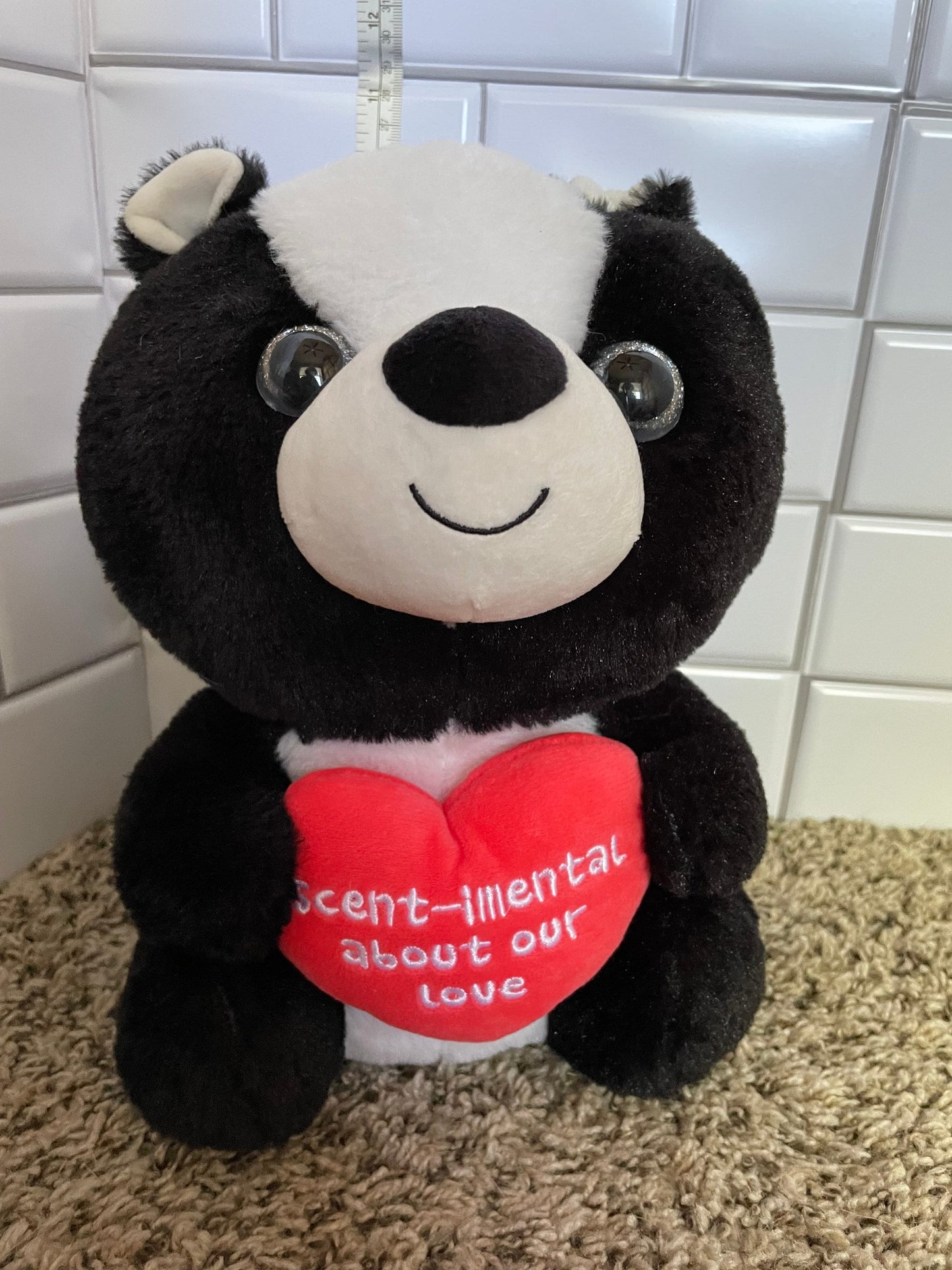 Black And White Skunk Plush With Red Heart