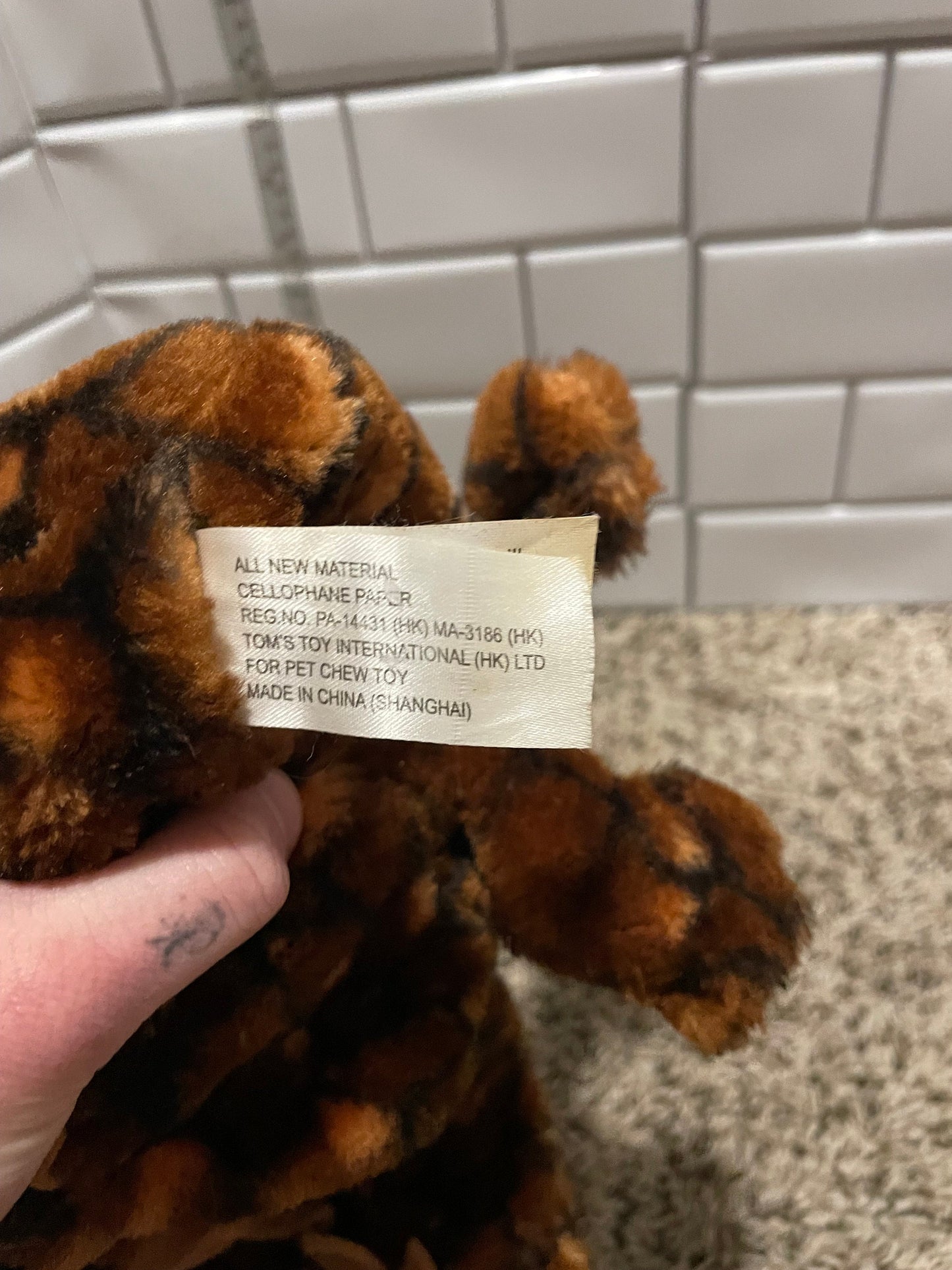 Tom’s Toy International Crinkle dog toy plush