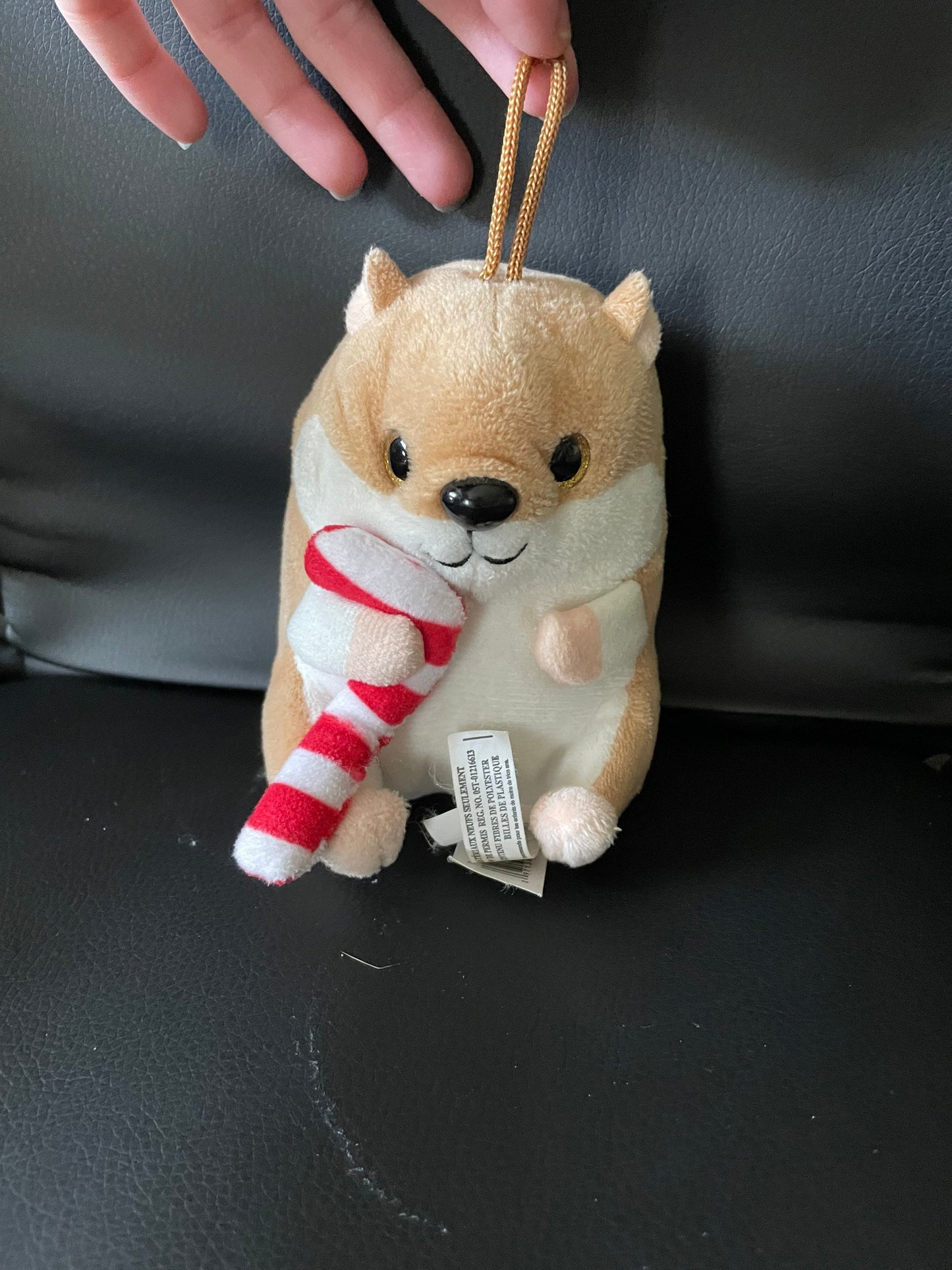 Small hamster ornament with candy cane plush