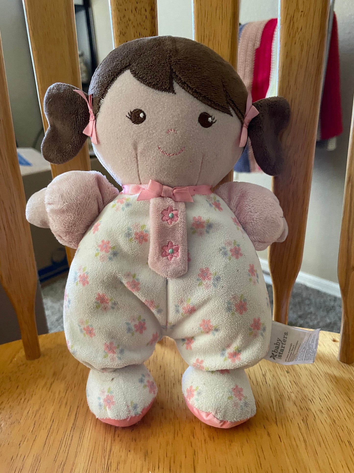 Baby Starters Brunette Olivia Rattle Baby Doll Plush 10”