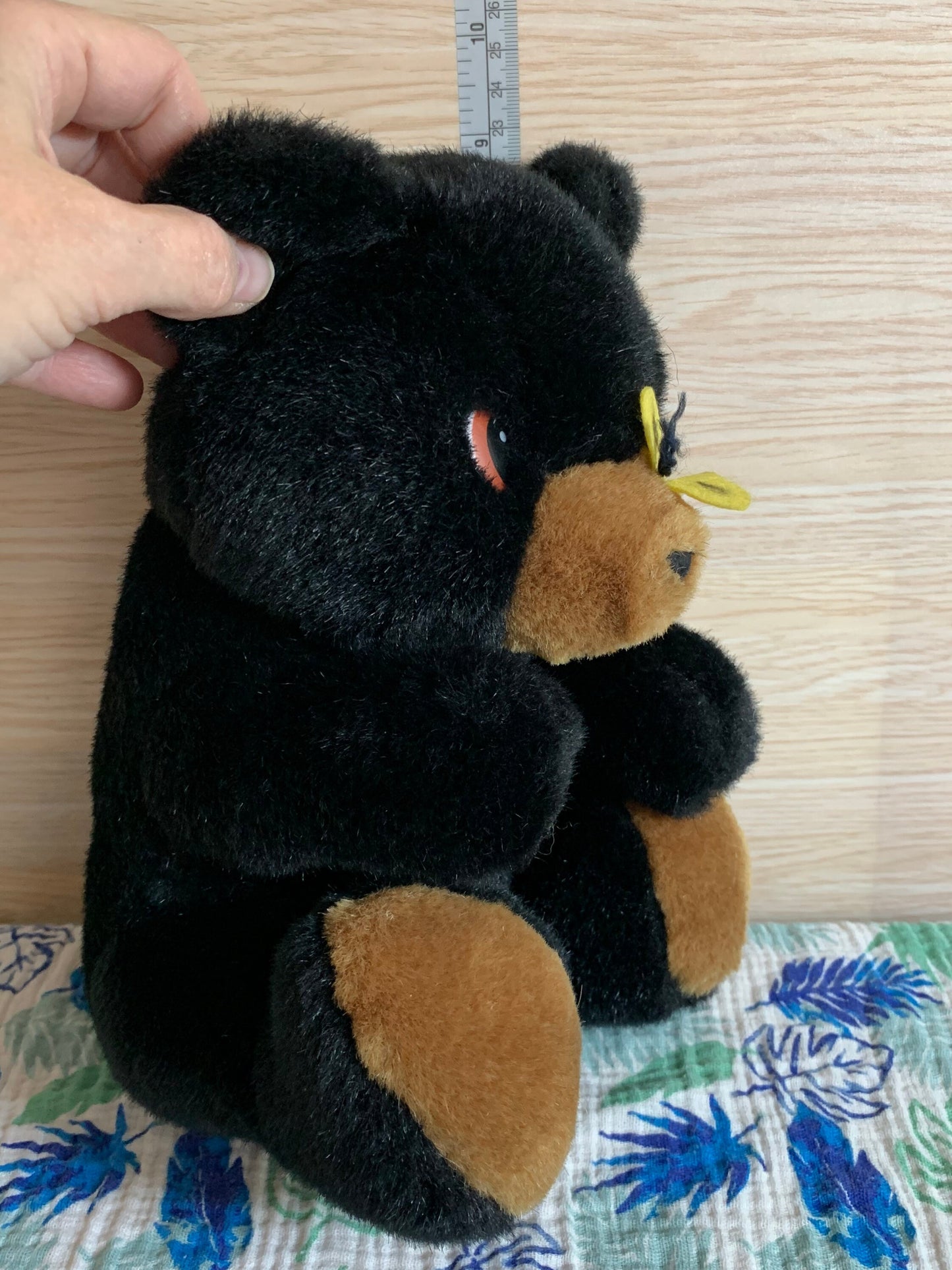 Vintage 1988 Sugar Loaf Black Bear Plush with Yellow Butterfly on nose.