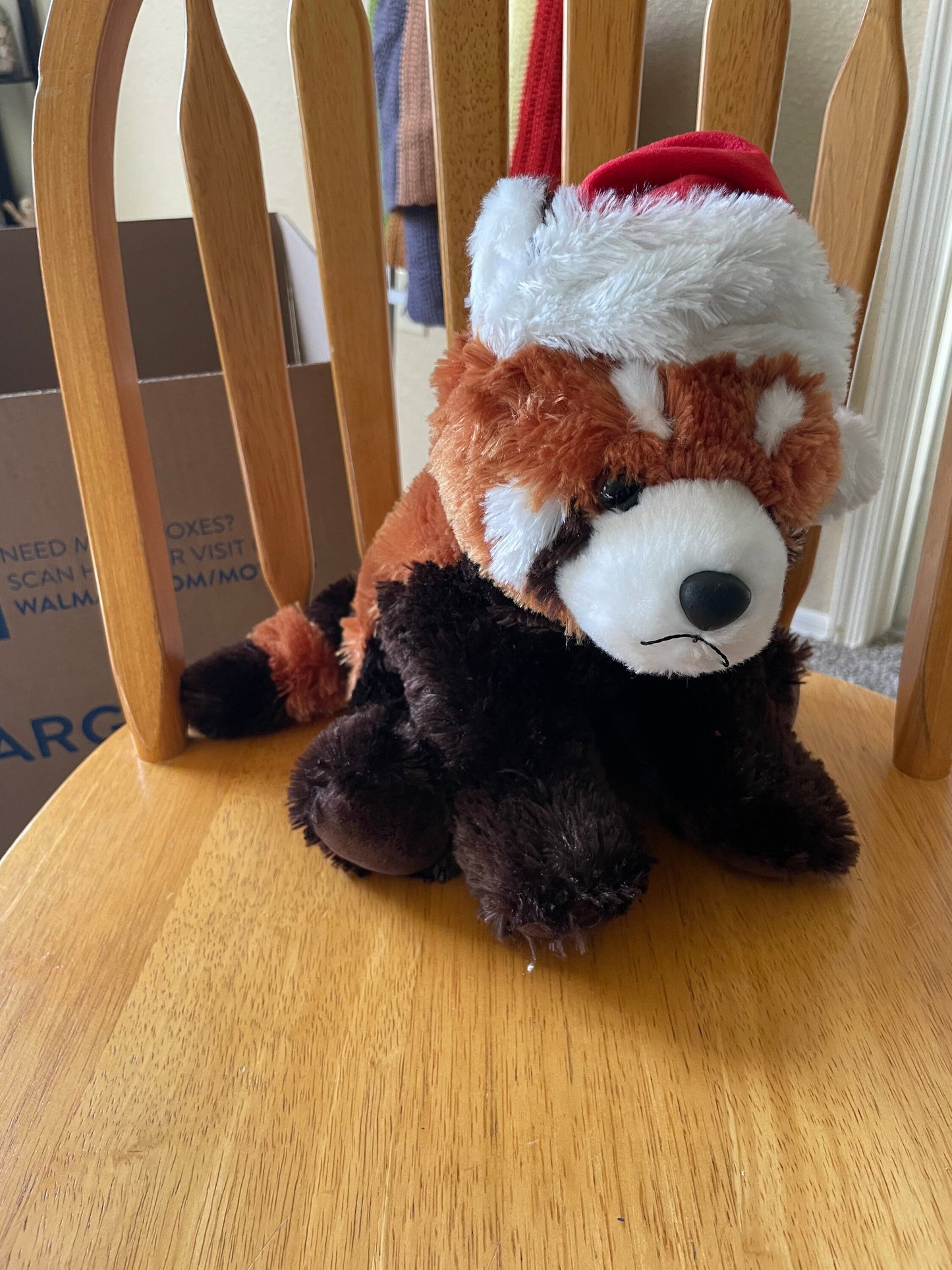 Destination nation red panda in santa hat plush