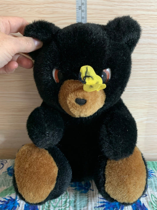 Vintage 1988 Sugar Loaf Black Bear Plush with Yellow Butterfly on nose.