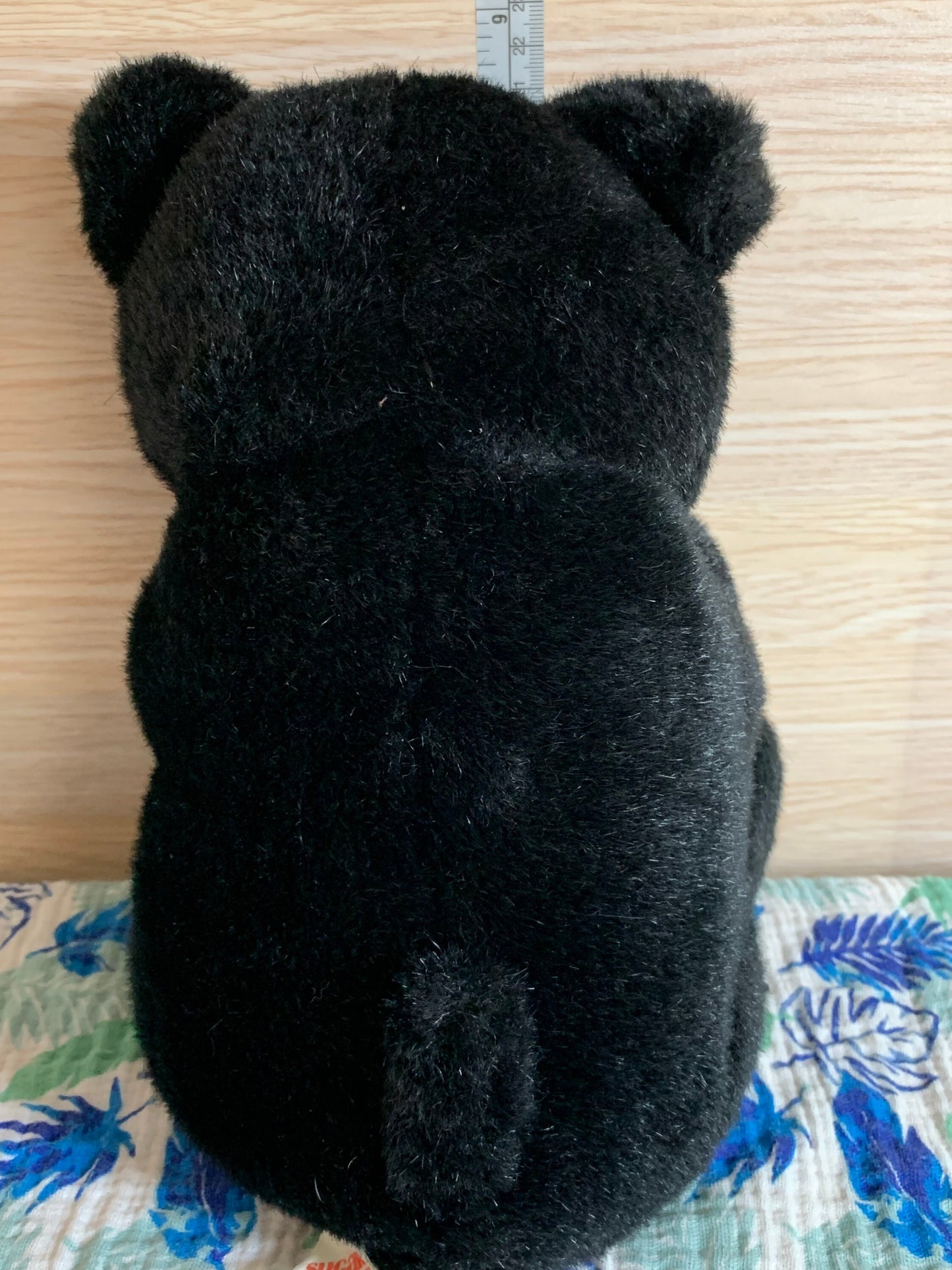 Vintage 1988 Sugar Loaf Black Bear Plush with Yellow Butterfly on nose.