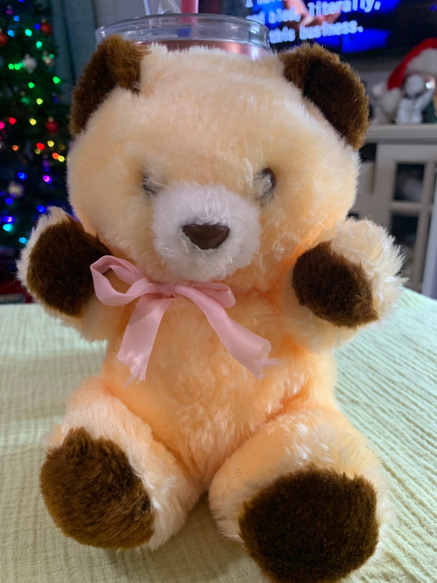 Vintage Great America Peach and brown Teddy Bear Plush with pink ribbon. 7.5”