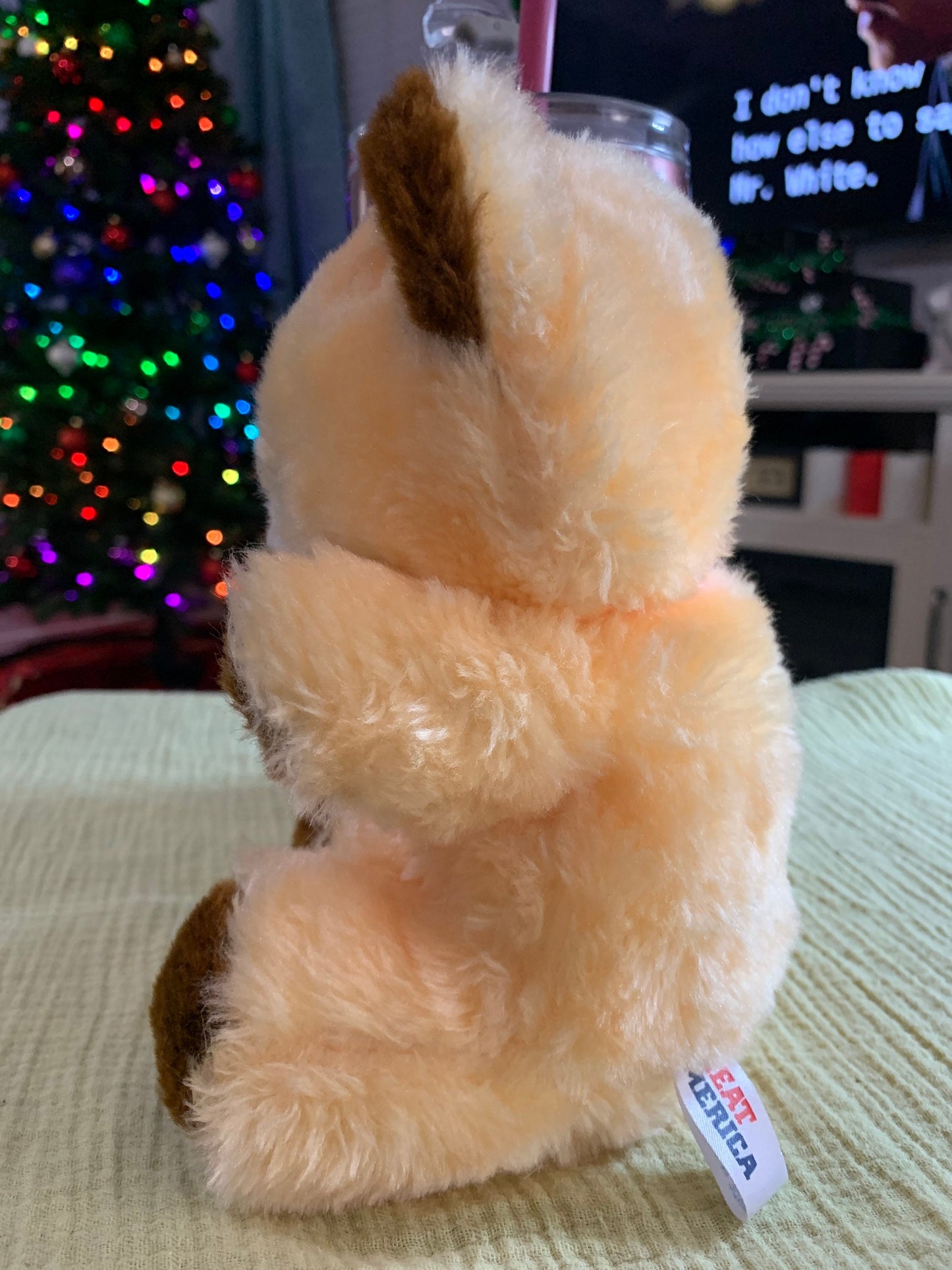 Vintage Great America Peach and brown Teddy Bear Plush with pink ribbon. 7.5”