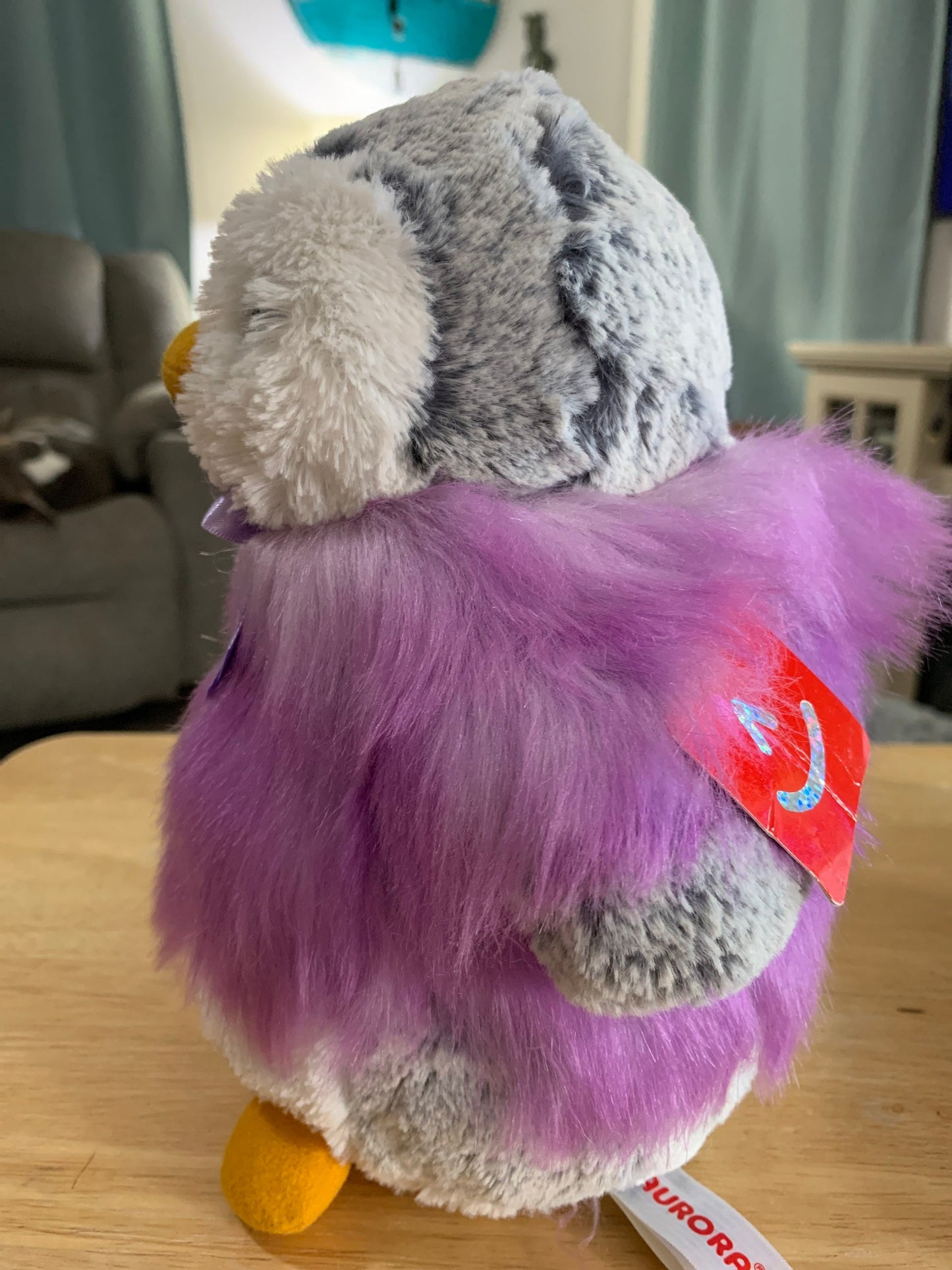Aurora Purple Pom Pom Gray and White Penguin Plush. Approximately 8.5” NWT
