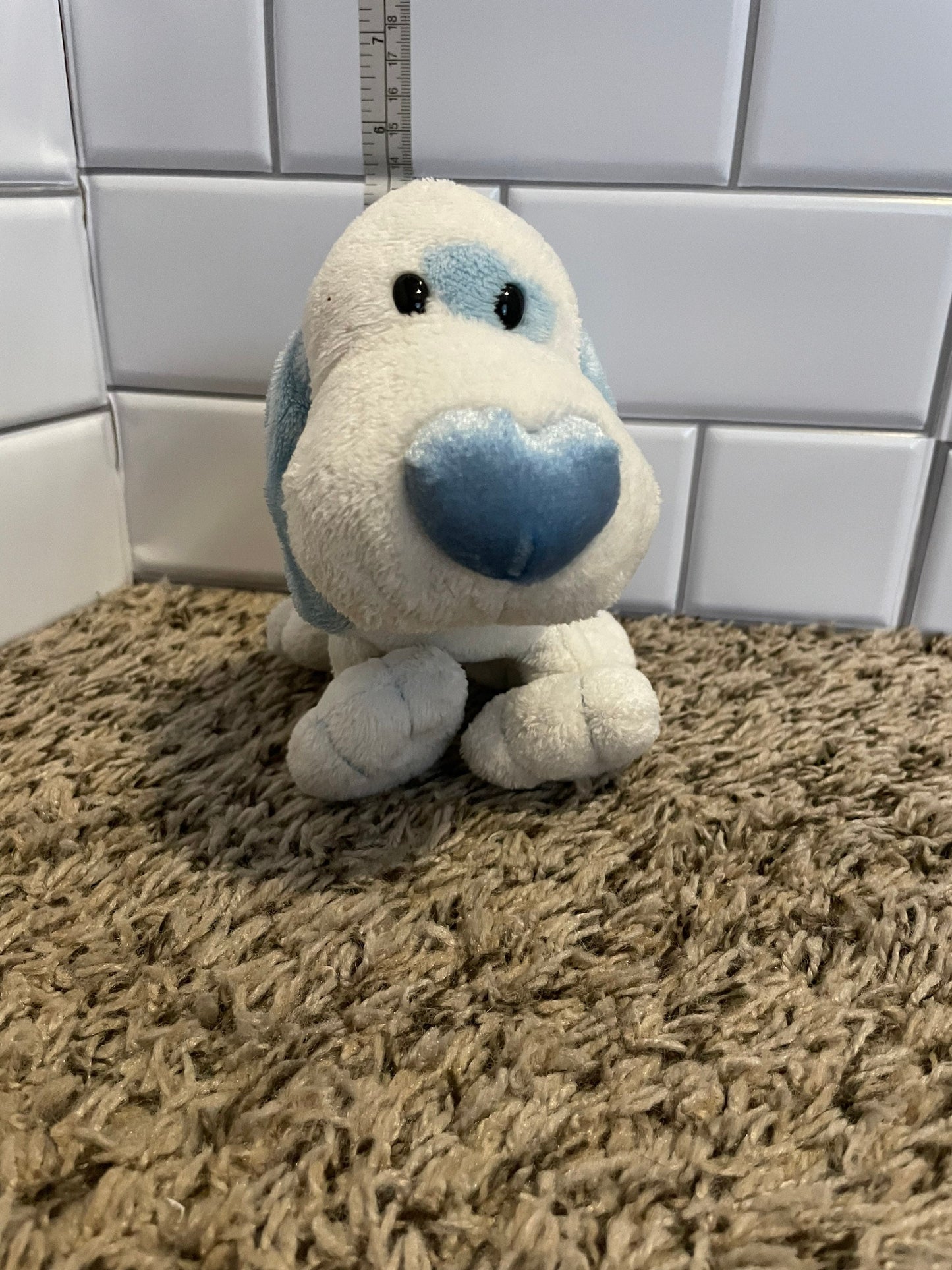 White and blue dog with heart shaped nose plush
