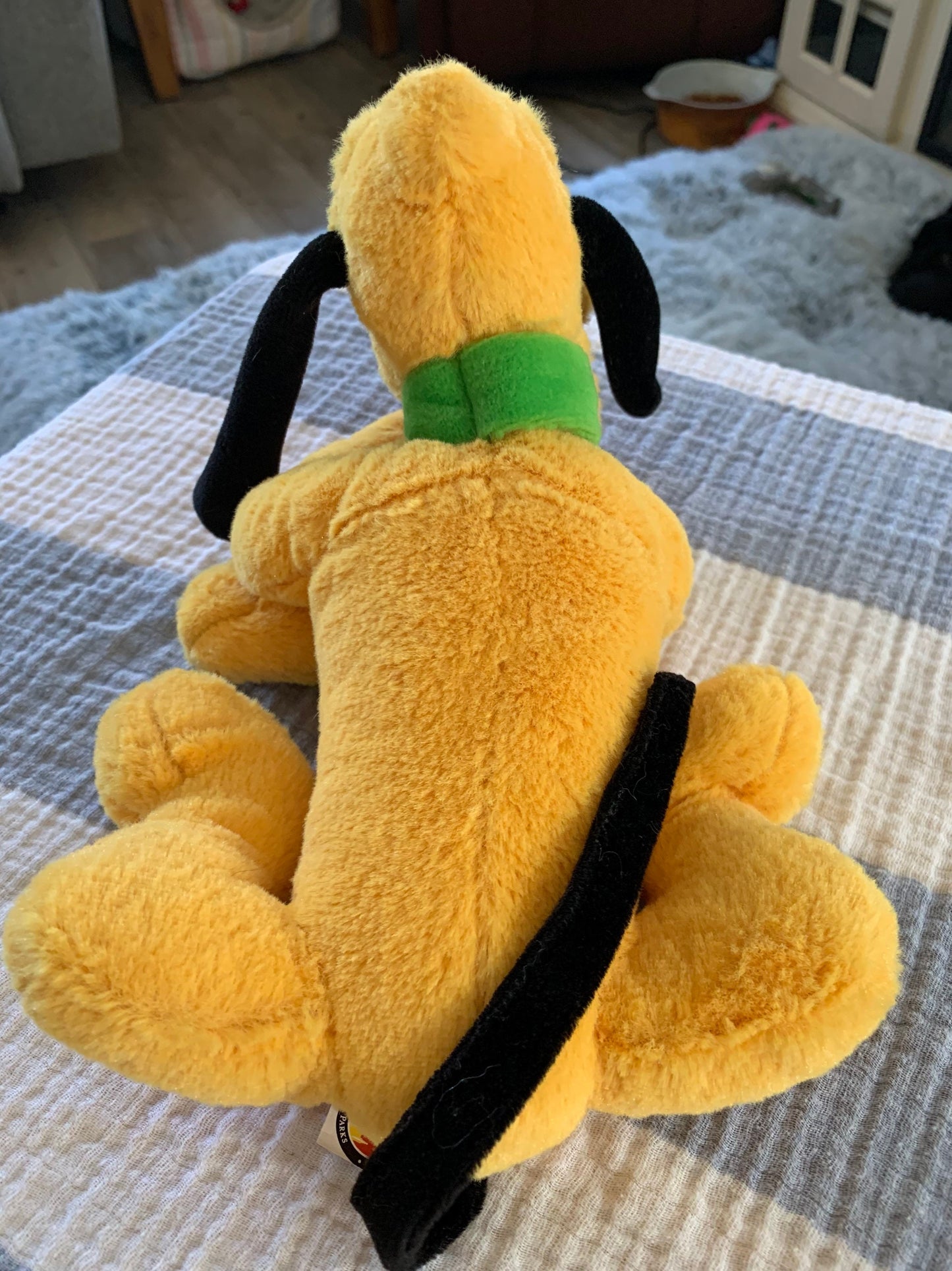 Disneyland Disney Parks Pluto Plush. Smaller. 5” tall. 10” long. Excellent condition!