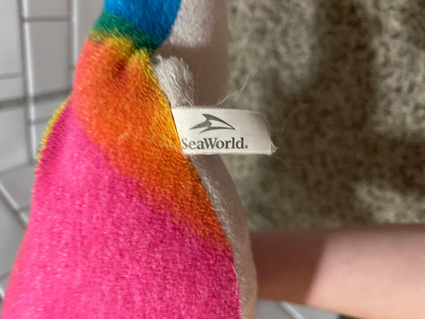 Seaworld rainbow dolphin plush