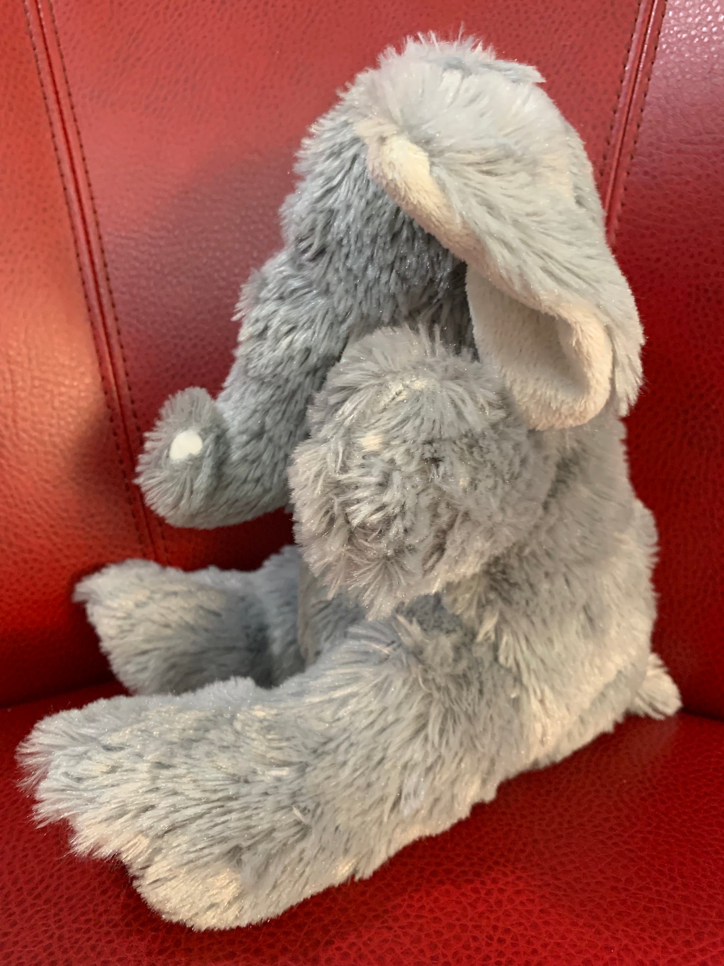 Elephant Plush. Unbranded. Gray and White with tusks. Very soft. Approximately 8-9”