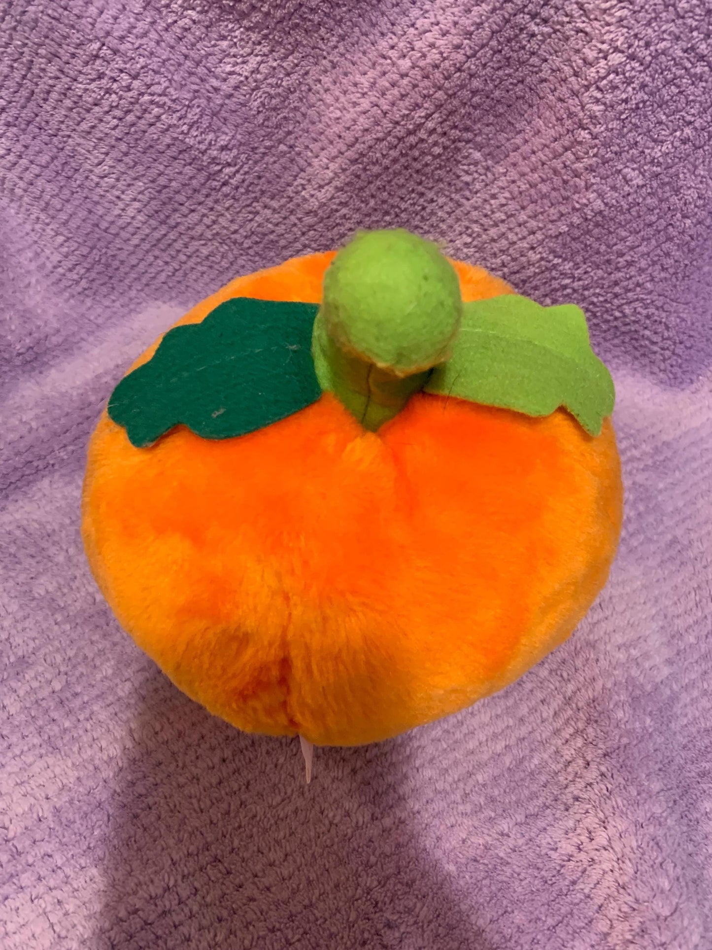 Orange Jack O’ Lantern Smiling Pumpkin Plush. Green Stem. Hard Plastic Purple Eyes. Vintage