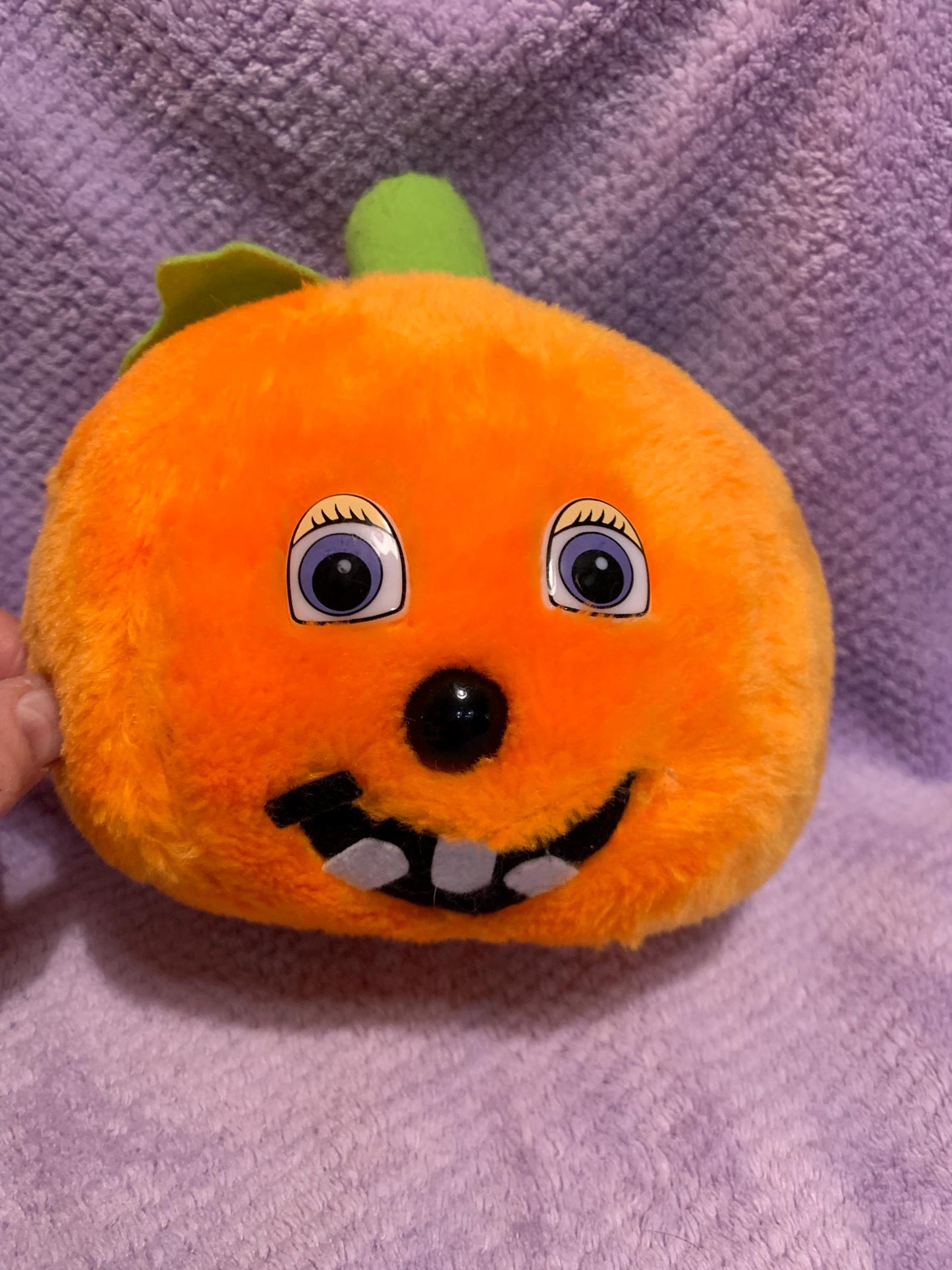 Orange Jack O’ Lantern Smiling Pumpkin Plush. Green Stem. Hard Plastic Purple Eyes. Vintage
