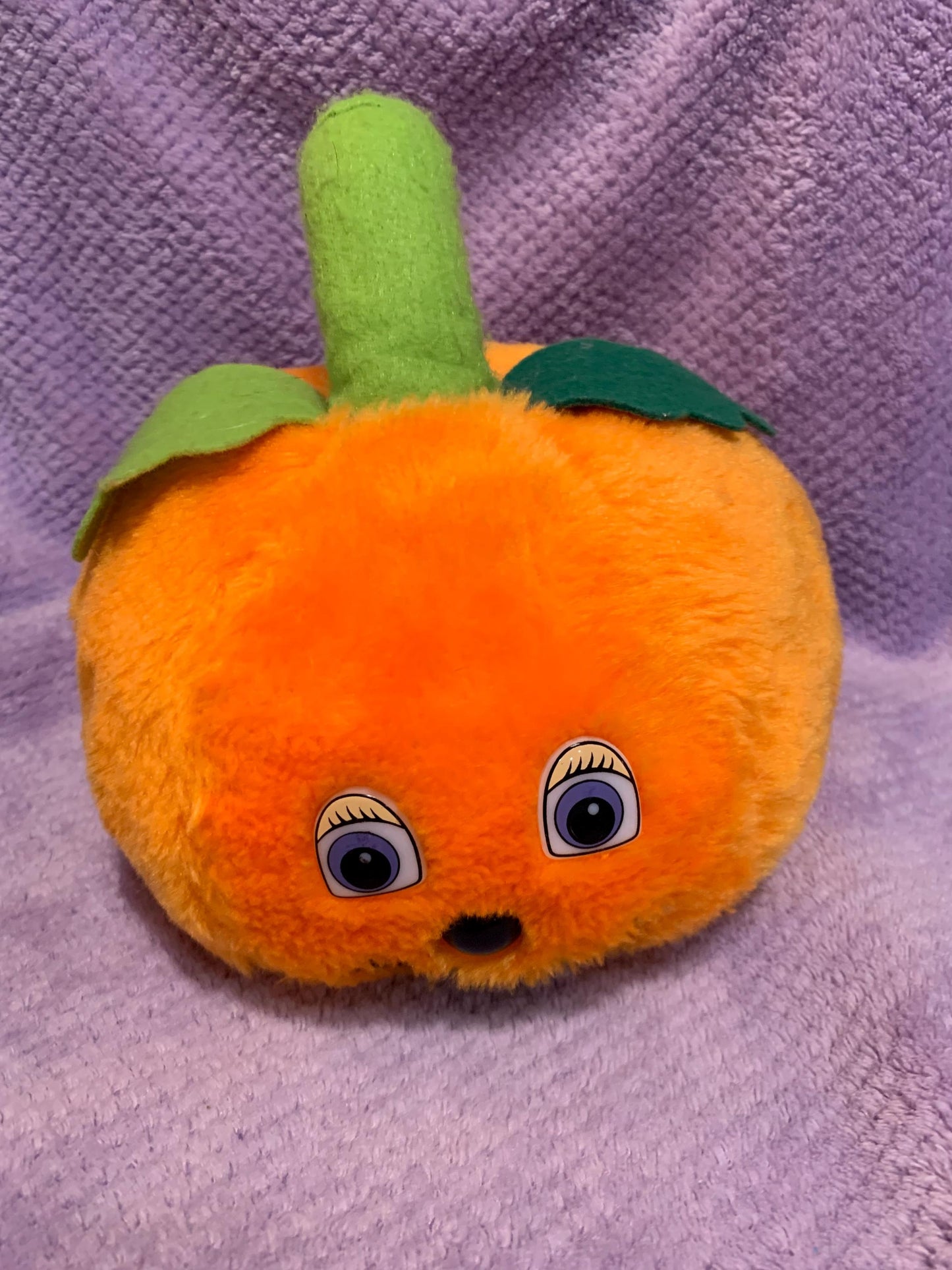 Orange Jack O’ Lantern Smiling Pumpkin Plush. Green Stem. Hard Plastic Purple Eyes. Vintage