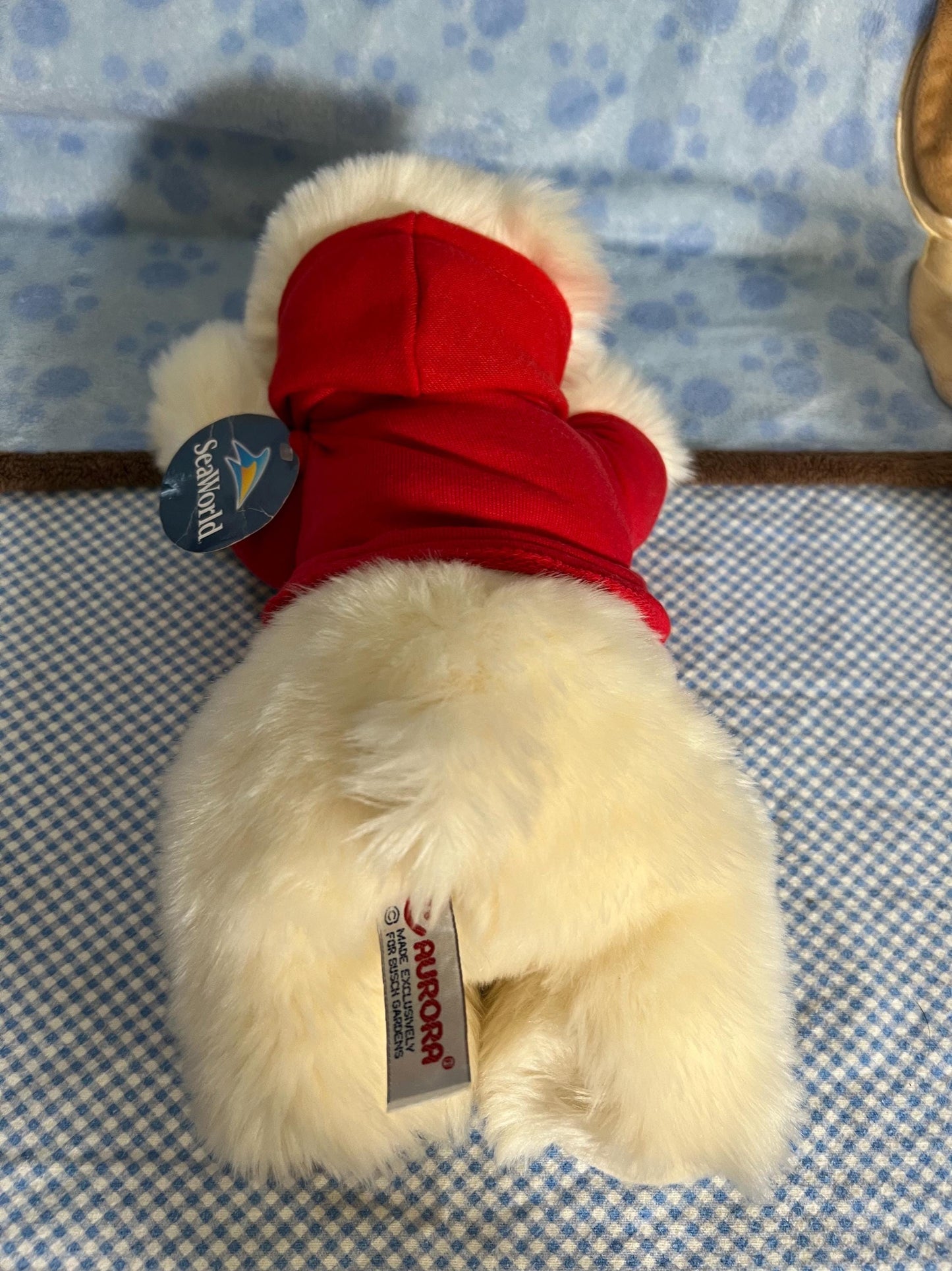Aurora Sea World Busch Gardens White Polar Bear Plush. Red London Hoodie Laying Down