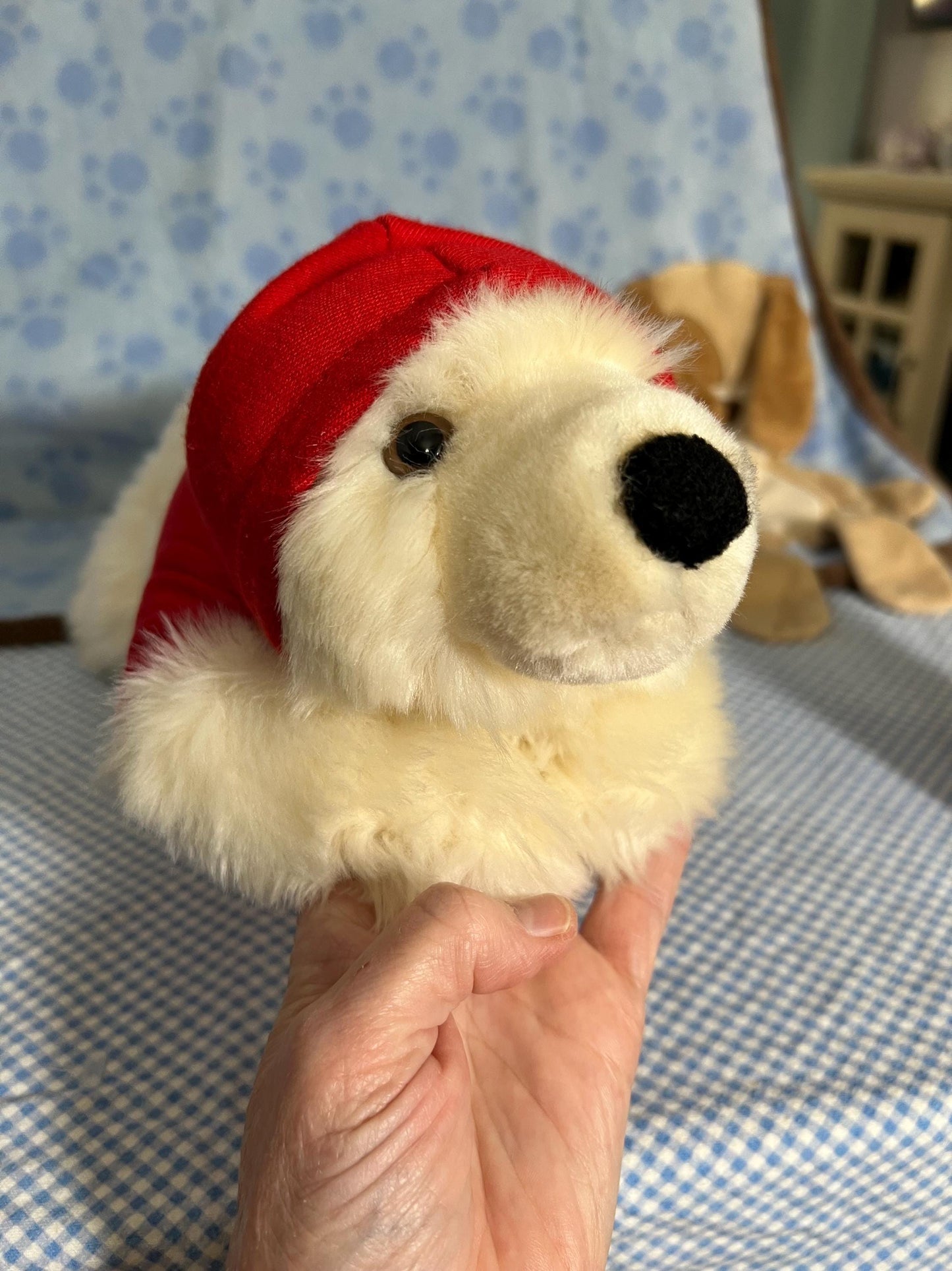 Aurora Sea World Busch Gardens White Polar Bear Plush. Red London Hoodie Laying Down
